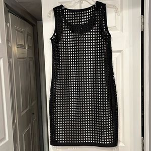 Muse black dress. Has white slip that shows through the black. Sleeveless size 0